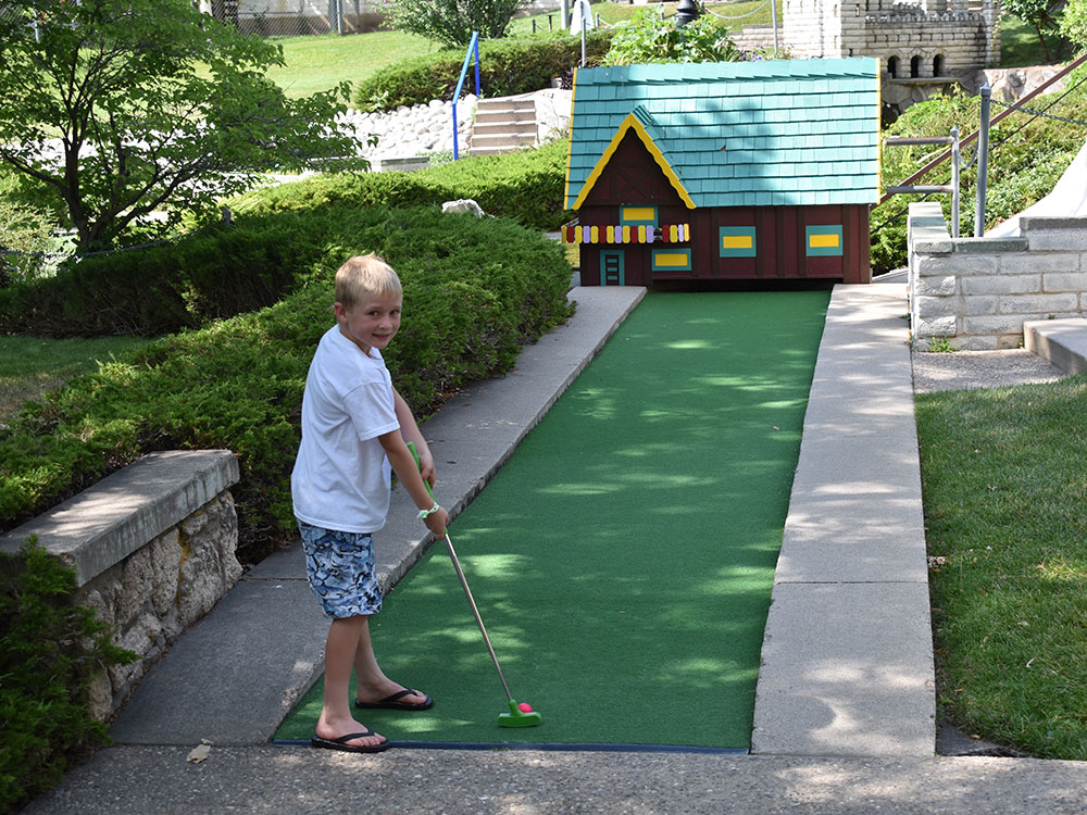 Miniature Golf Player at Cherry Hill Water Park, Family Fun Center & Camping Resort